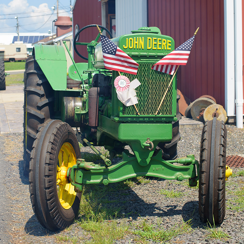 John Deere antique green and yellow tractor